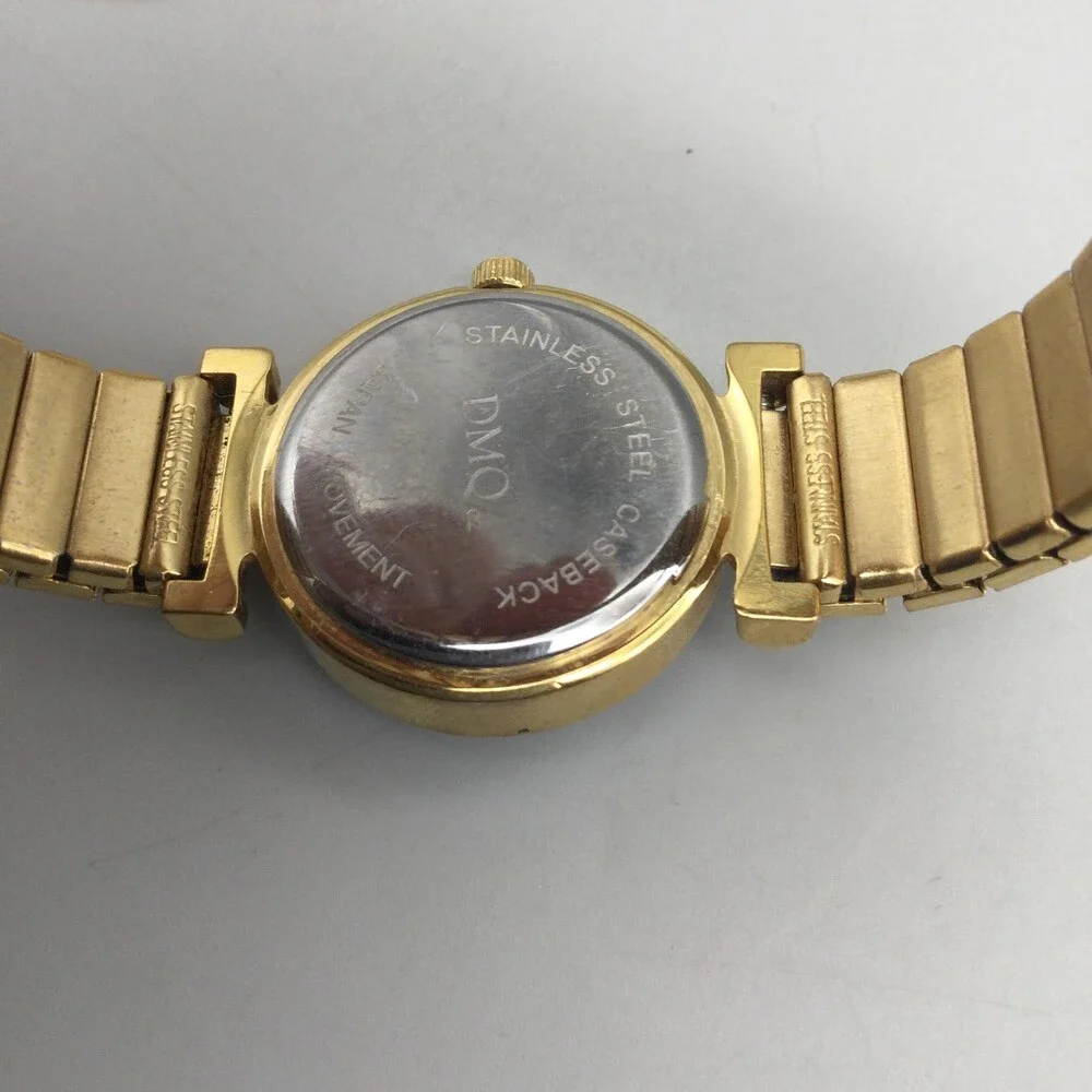 DMQ Womens Watch 24mm MOP Dial Gold Tone Crystals Stretch Band New Battery